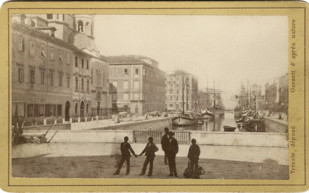 Trieste Grand Canal with sailing boats and bridge