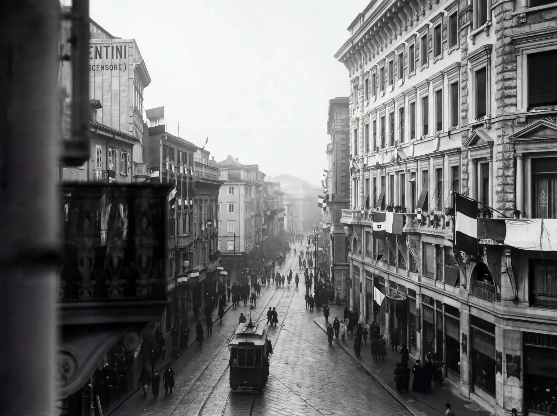Via del Corso with tram and flags